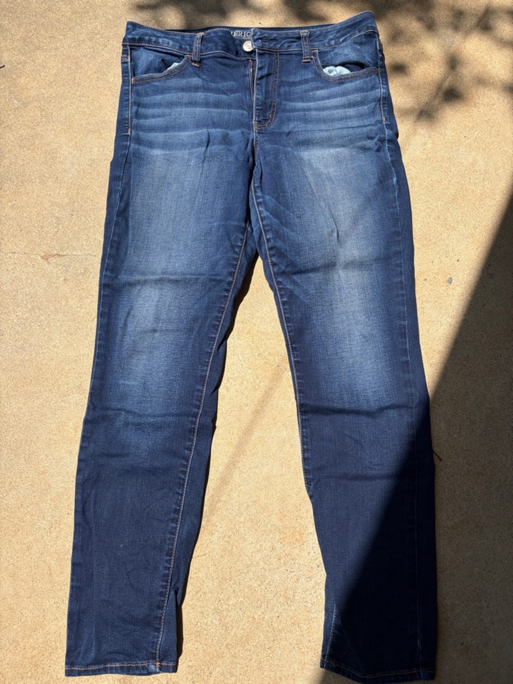 65% cotton American Eagle Super Stretch Hi-Rise Jegging